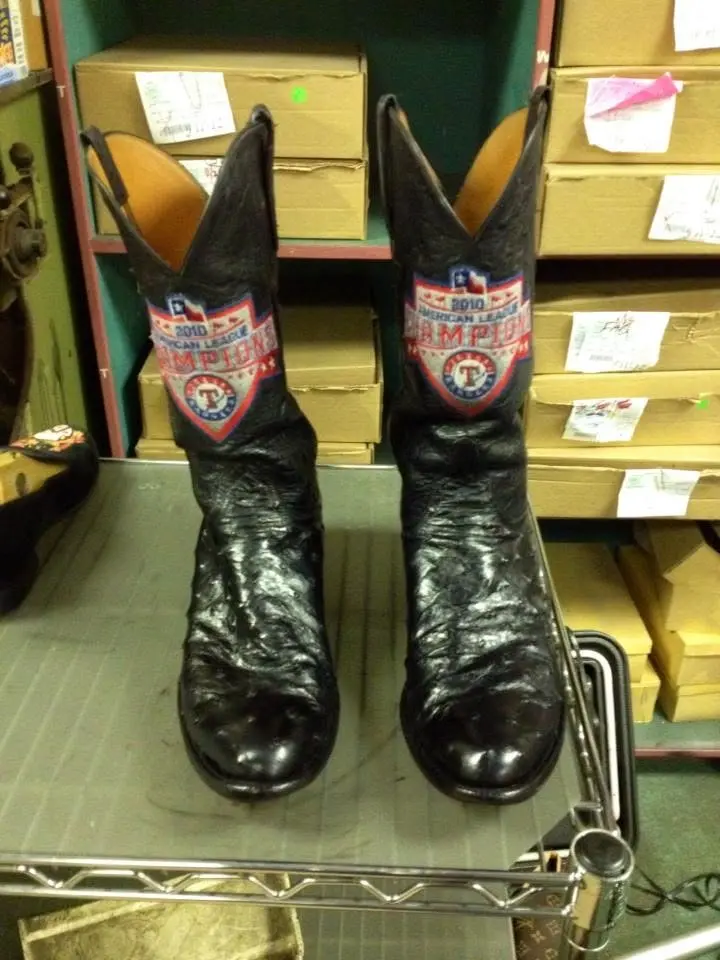 Restored black leather boots